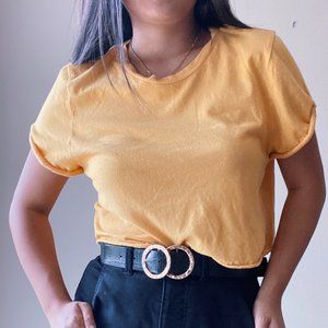 Yellow boxy crop top from Pacsun